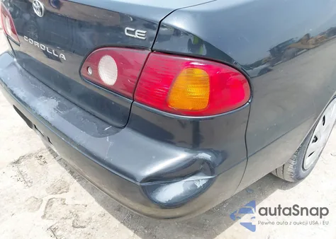 2002 Toyota Corolla Ce из США, поврежденный, VIN 2T1BR12E02C518874